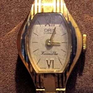 Oris Gold Timepiece with Ivory Dial